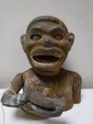 A cast metal money box