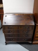 A late Victorian mahogany writing bureau on claw and ball feet CONDITION REPORT: