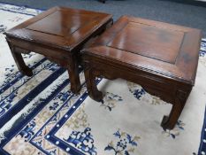 A pair of Oriental style lamp tables