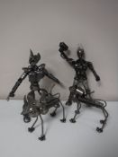 A tray containing four contemporary metal figures including Wolverine, Thor,