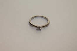 A platinum diamond solitaire ring,