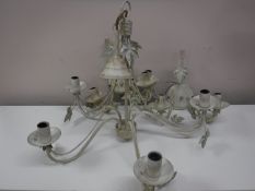 A white metal five way light fitting, together with a pair of matching wall lights,