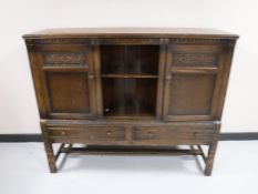 A carved oak sideboard