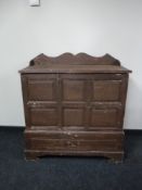 An early twentieth century pine mule chest fitted with a drawer
