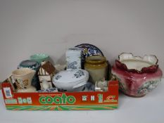 Three boxes containing assorted china dolls, figurines,