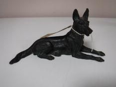 A bronze figure of an Alsatian