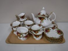 A tray containing a twenty seven piece Royal Albert Country Roses tea service