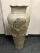 A tall slender vase,