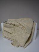 Two Ikea lidded storage Ottomans containing curtains