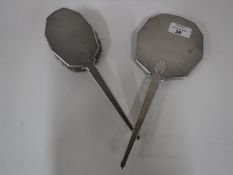 A silver dressing table mirror and matching hair brush with engine turned decoration