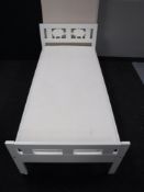 An Ikea children's bed frame with interior