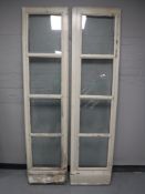 A pair of twentieth century glass panelled doors