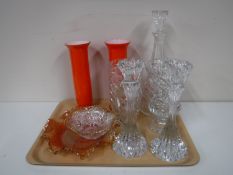 A tray containing lead crystal candle sticks, decanter, assorted vases, carnival glass bowl,
