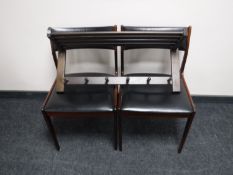 A pair of Danish dining chairs and a pine wall rack with shelf