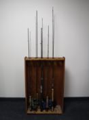 Five two-piece fishing rods in bags including Shakespeare and Daiwa