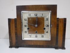 An oak cased Silent chime mantel clock
