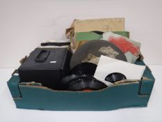 A box containing assorted 45's, 80's, etc,