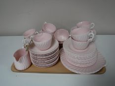 A 47 piece Minton china tea service on pink ground