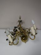 A continental brass five-way light fitting together with a copper three-way light fitting and a