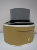 A gents formal top hat in box by W. L.