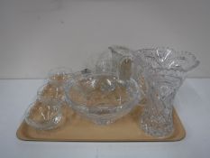 A tray containing lead crystal glassware, including vase, jugs, Sundae dishes,