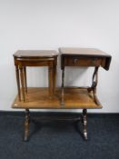 A mahogany coffee table with under stretcher together with a nest of two mahogany inlaid bowfronted