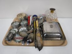 A tray containing assorted flat ware, cut glass perfume bottle, plated lidded butter dish,