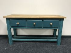 A painted pine kitchen three drawer preparation table