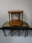 A nest of three mahogany tables and a hexagonal occasional table