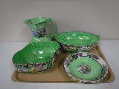 A tray containing five pieces of Maling lustre ware,