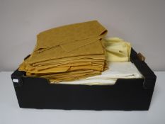 Three boxes containing Damask table cloths