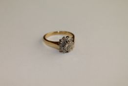An 18ct gold diamond cluster ring