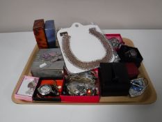 A tray of a quantity of costume jewellery including necklaces, earrings, wristwatches,