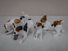 Four Royal Doulton figures of terriers