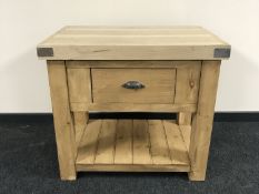A reclaimed pine butchers block fitted a drawer