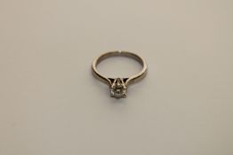 An 18ct white gold solitaire diamond ring