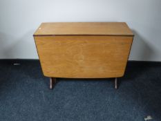 A teak G plan drop leaf table