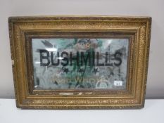 An early 20th century and later gilt framed advertising mirror - 1608 Bushmills Irish Whiskey
