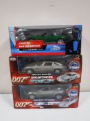 Three boxed James Bond die cast vehicles