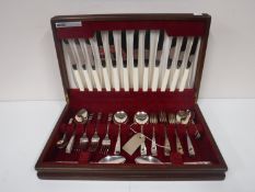 A mahogany canteen of Viners cutlery