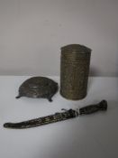An Eastern brass enamelled dagger in sheath together with an embossed lidded brass jar and a