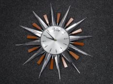 A late twentieth century Metamec quartz sunburst clock CONDITION REPORT: No