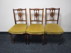 A set of three Victorian inlaid rosewood drawing room chairs