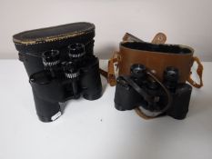 A cased set of Greenkat 8x40 binoculars and a set of Wray of London 8x30 binoculars
