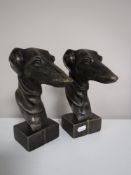 Two cast metal busts of greyhound heads