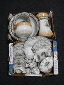 Two boxes containing a hunting scene dinner service and a five piece English pottery wash set
