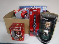 Three boxes containing new toys and games, including Shell V power die cast vehicles,