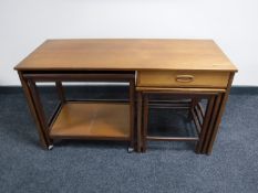 A mid 20th century teak side table fitted a drawer,