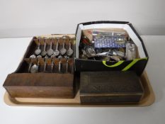 A tray of crested tea spoons, baby spoon,