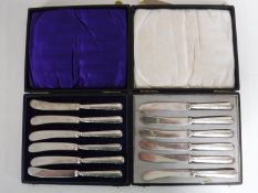Two boxed sets of six sterling silver handled butter knives